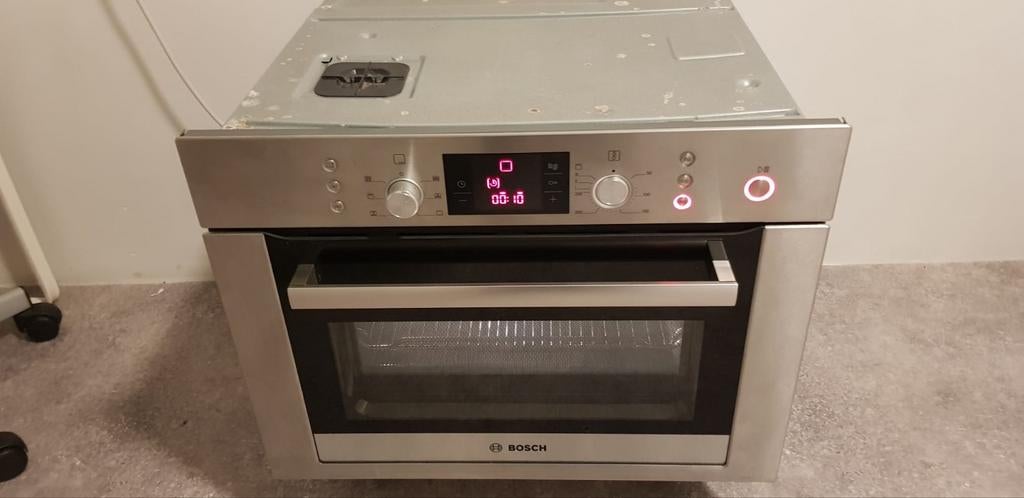 Mooie Bosch RVS inbouw oven met magnetron functie te koop., Ophalen, 45 tot 60 cm