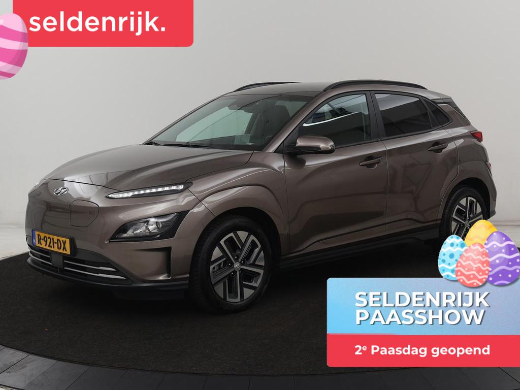 Hyundai Kona EV Fashion 64 kWh | SOH 100% | 3 Fase | Head-Up, Stof, Gebruikt, Bruin, Origineel Nederlands