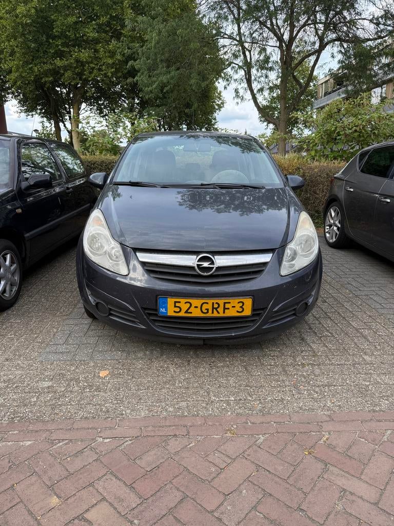 Opel Corsa 1.2 16V 5D 2008 Grijs, Voorwielaandrijving, 4 cilinders, 1229 cc, 49 €/maand
