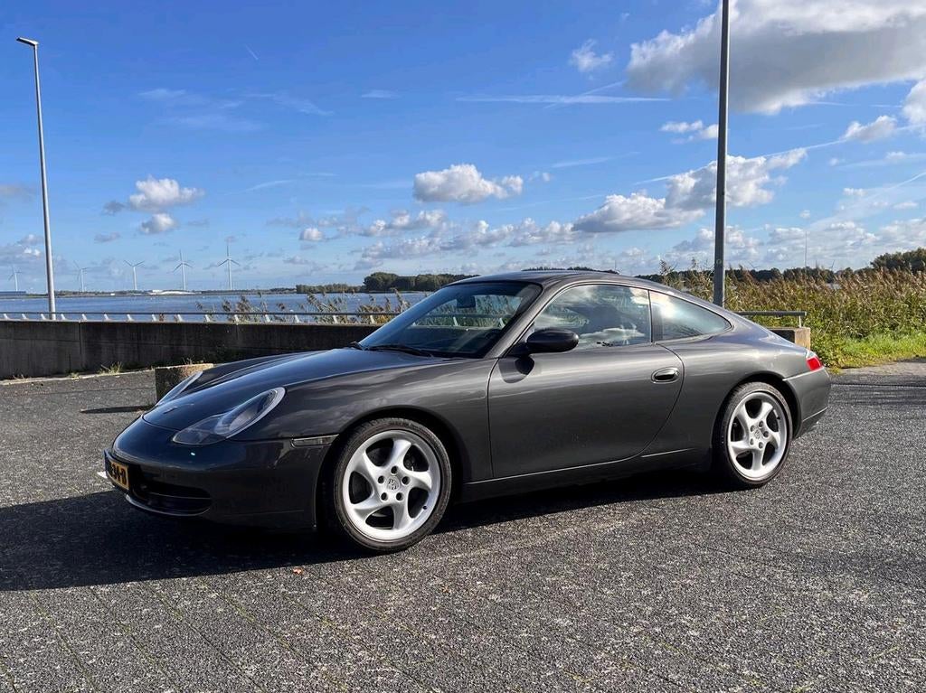 Porsche 911 Coupe Carrera 996 Grijs Schuifdak Dealer Ondh., Auto's, Automaat, Achterwielaandrijving, 4 stoelen, 301 pk