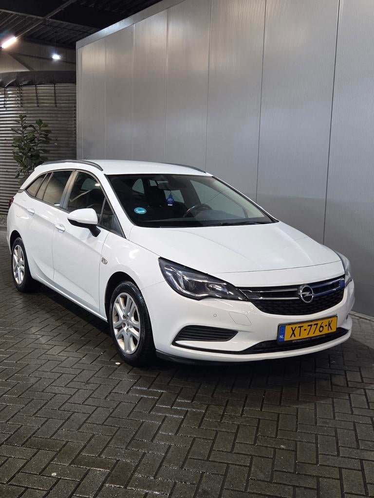 Opel Astra 1.0 Turbo 105pk Start/stop 2020 Wit, Auto's, Opel, Bedrijf, Astra, Achteruitrijcamera, Alarm, Android Auto, Bluetooth