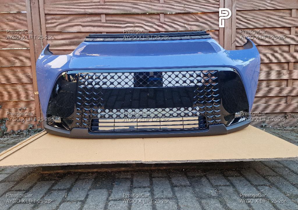 TOYOTA AYGO X LIFT 2026 VOORBUMPER NIEUWE KLEUR 606, Auto-onderdelen, Verzenden, Nieuw, Toyota, Bumper