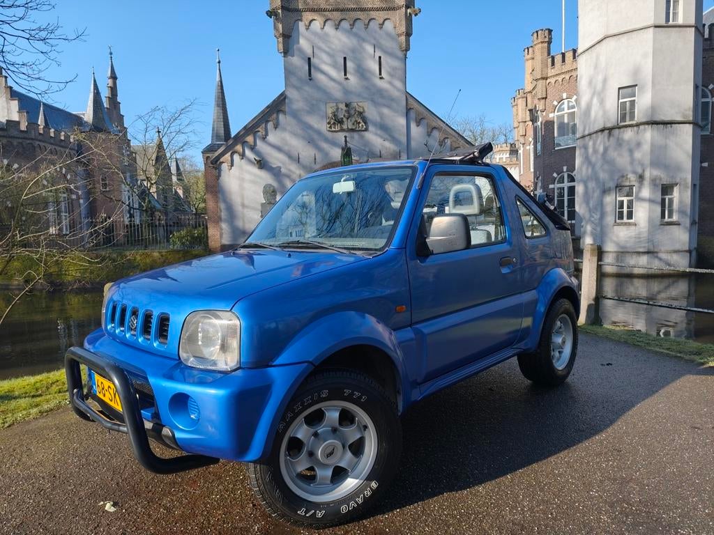 Suzuki Jimny 1.3 Cabrio 4WD / trekhaak / abs / NAP !!, Auto's, 13 km/l, Stof, 40 €/maand, 4 cilinders