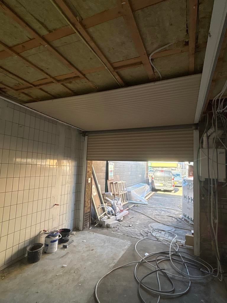 Elektrische roldeur voor garage of bedrijfsruimte, Ophalen, Gebruikt, 200 cm of meer, Crème of Beige