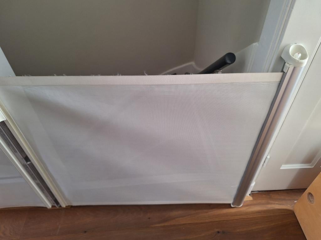 Traphek Kiddy Guard Avant Wit - Oprolbaar Veiligheidshek, Kinderen en Baby's, Traphekjes, Overige materialen, Oprolhekje, Ophalen of Verzenden