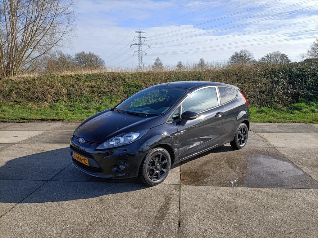 Ford Fiësta 1.25  2009 135000 km, Voorwielaandrijving, 4 cilinders, Zwart, Bedrijf