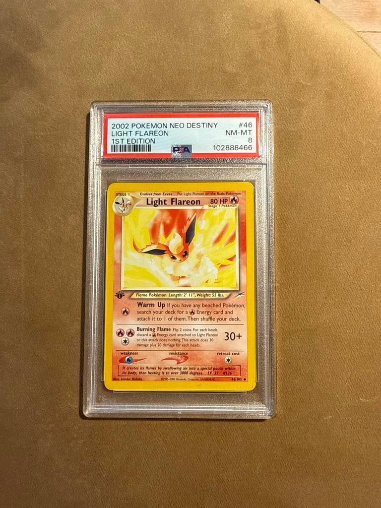 Pokémon Light Flareon 2002 Neo Destiny 1st Edition PSA 8, Ophalen of Verzenden, Zo goed als nieuw, Losse kaart