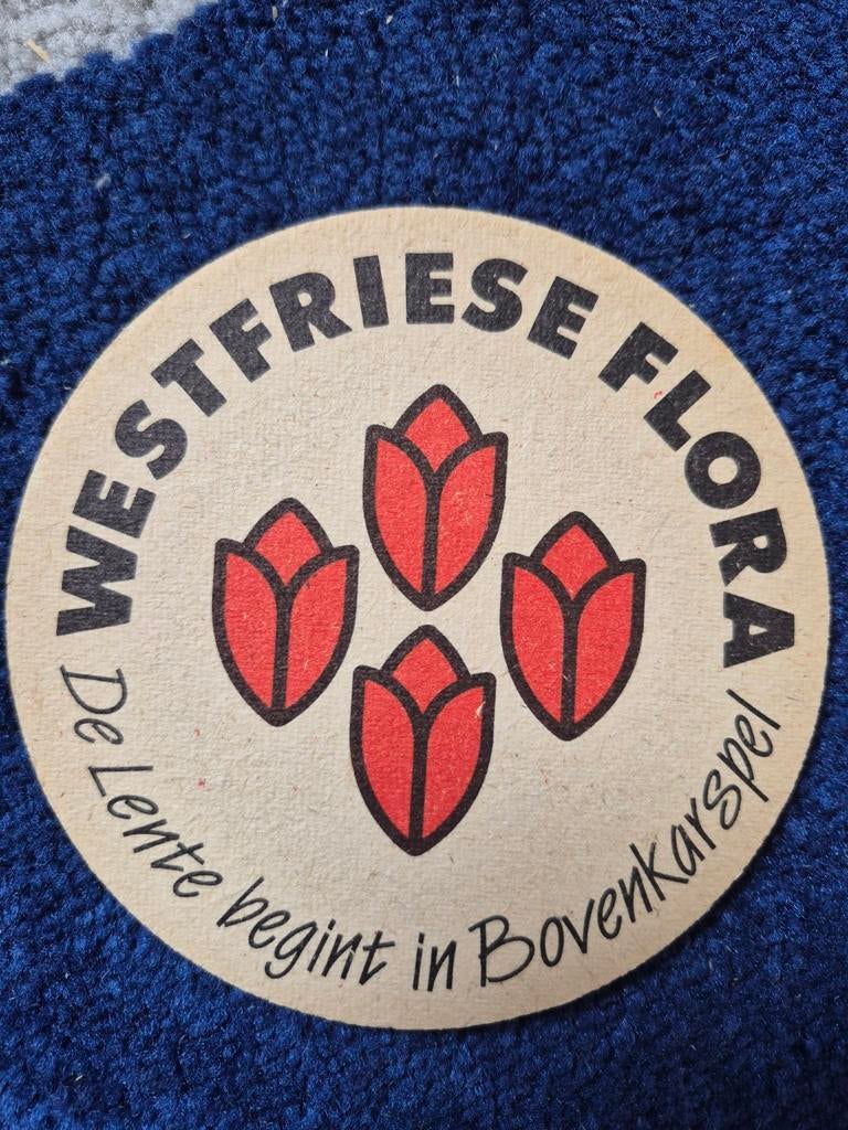 Bierviltje Westfriese Flora - De Lente begint in, Verzamelen, Merken en Reclamevoorwerpen, Ophalen of Verzenden