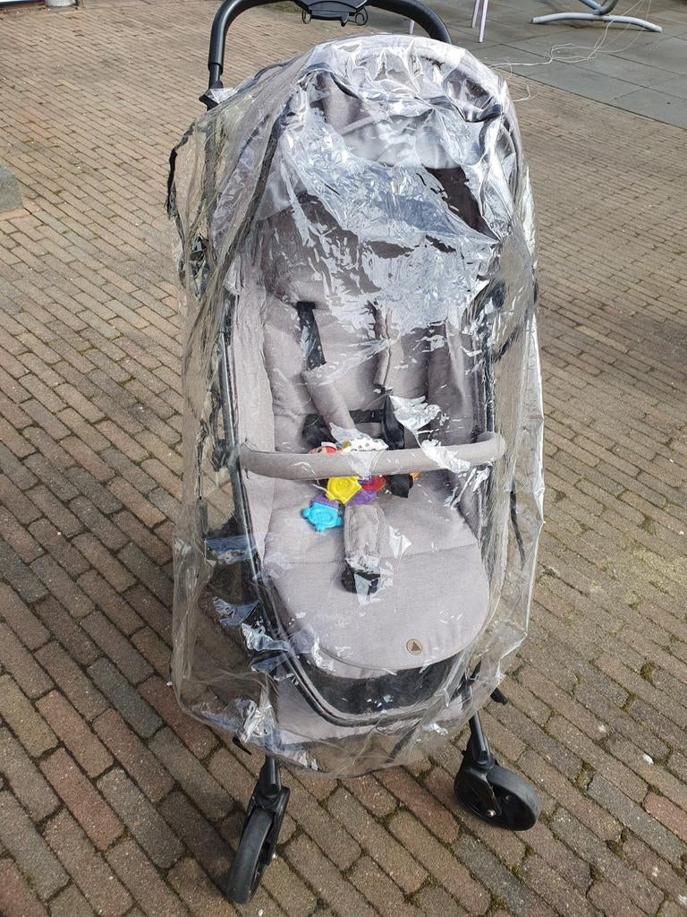 Topmark buggy met regenhoes, Ophalen