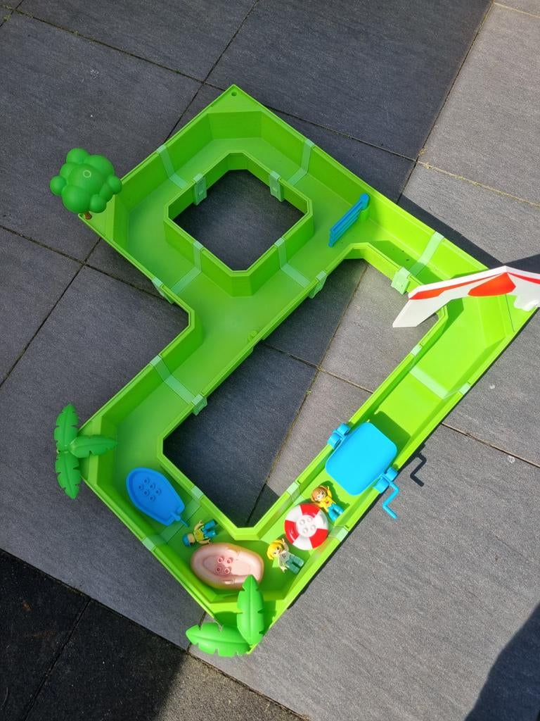 Waterbaan met bootjes en poppetjes, Ophalen