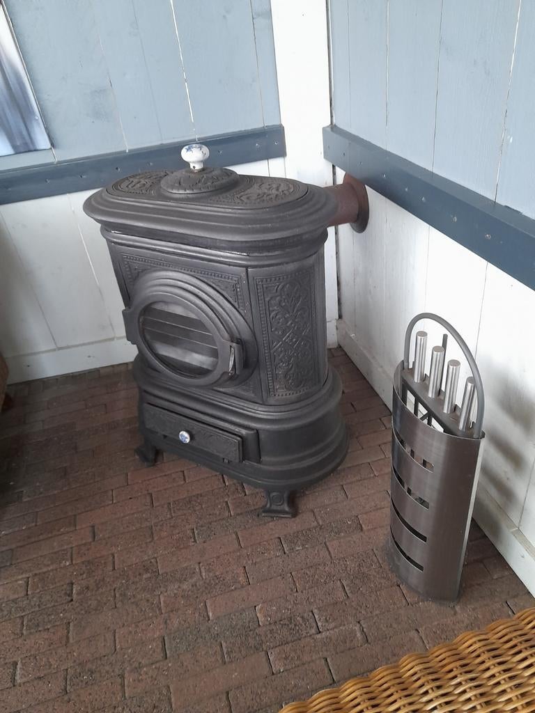 Gietijzeren houtkachel, Ophalen