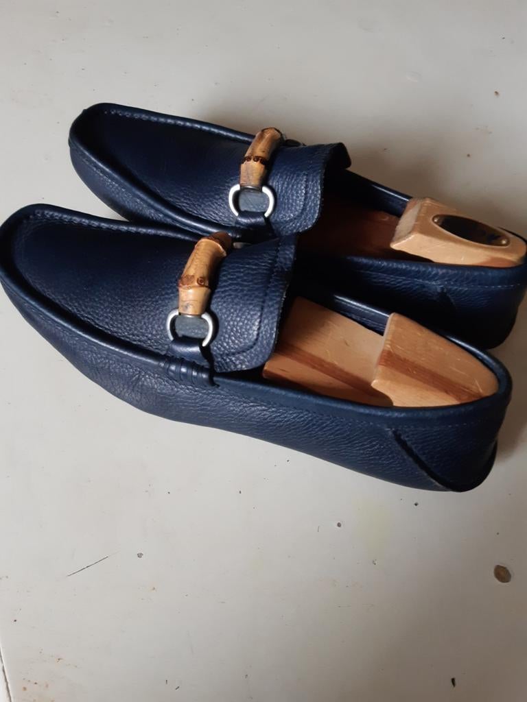 Gucci 8G (42), Ophalen of Verzenden, Gedragen, Blauw