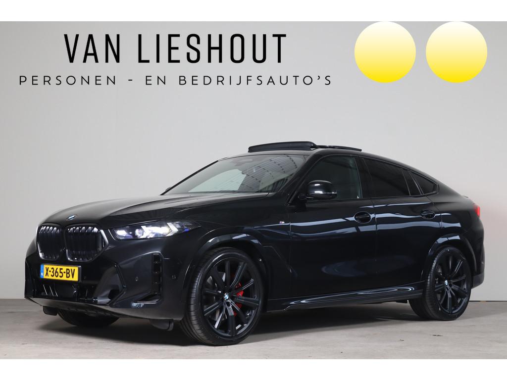 BMW X6 xDrive40i M-Sport NL-Auto! Bow.Wil I Swarovski I Sky, Auto's, Gebruikt, Euro 6, 138 €/maand, Zwart
