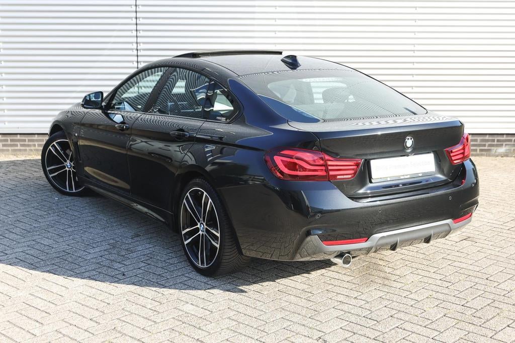 BMW 4 Serie Gran Coupé 418i High Executive M Sport Automaat, Gebruikt, Met garantie (alle), Alcantara, Zwart