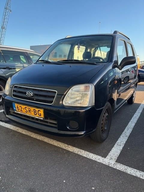 Suzuki Wagon R+ 1.0 2006 Zwart, Auto's, Suzuki, Voorwielaandrijving, Stof, 40 €/maand, Wagon R+