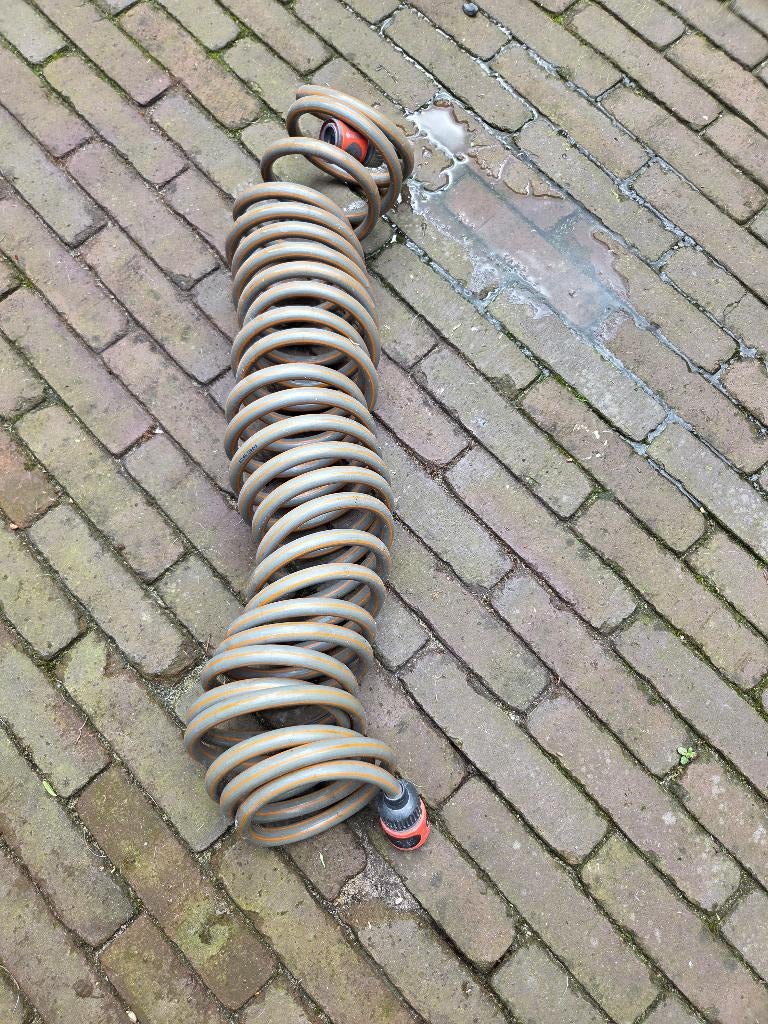 Gardena spiraal tuinslang, Tuin en Terras, Tuinslangen, Ophalen, Zo goed als nieuw, Tuinslang