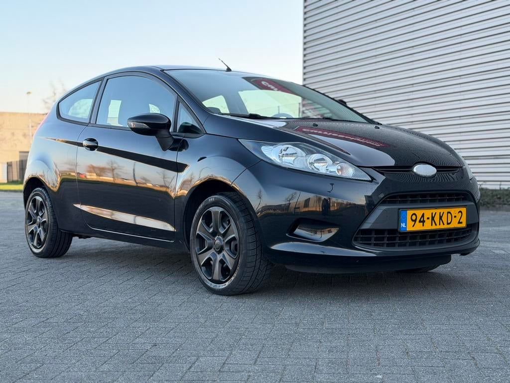 Ford Fiësta 1.25 44KW 3DR 2010 Zwart, Auto's, Voorwielaandrijving, Euro 5, Stof, 4 cilinders