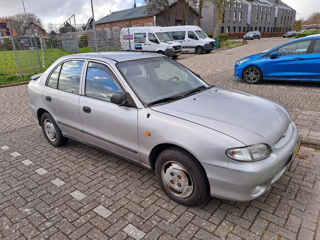 Hyundai Excel 1.3 LS LB 1999 Grijs, Auto's, Hyundai, Particulier, Excel, Benzine, Hatchback, Handgeschakeld, Origineel Nederlands