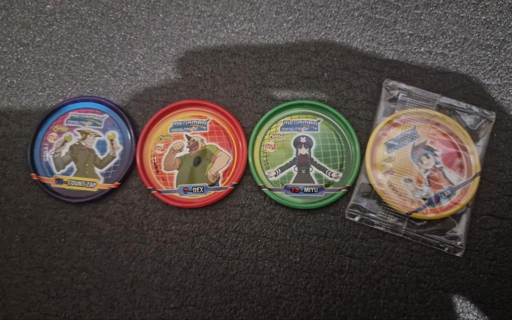4 MegaMan metal tazos te koop!, Ophalen of Verzenden, Losse flippo's