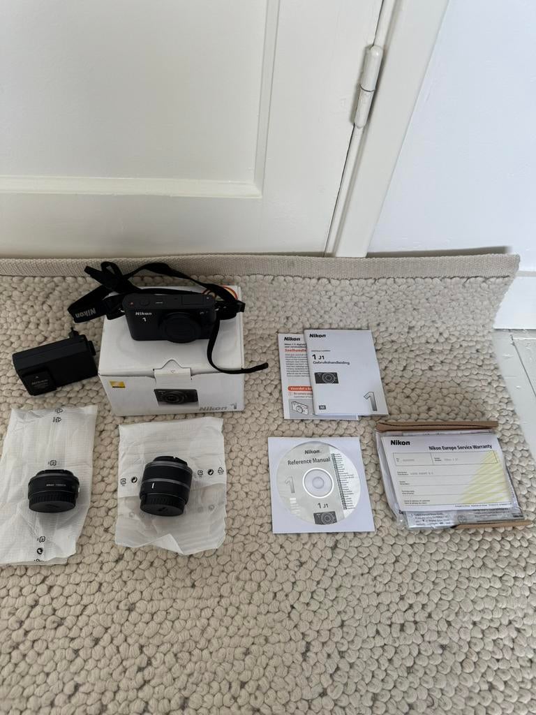 Nikon 1 J1 digitale camara met 2 lenzen, Audio, Tv en Foto, Fotocamera's Digitaal, Compact, Ophalen of Verzenden, Zo goed als nieuw