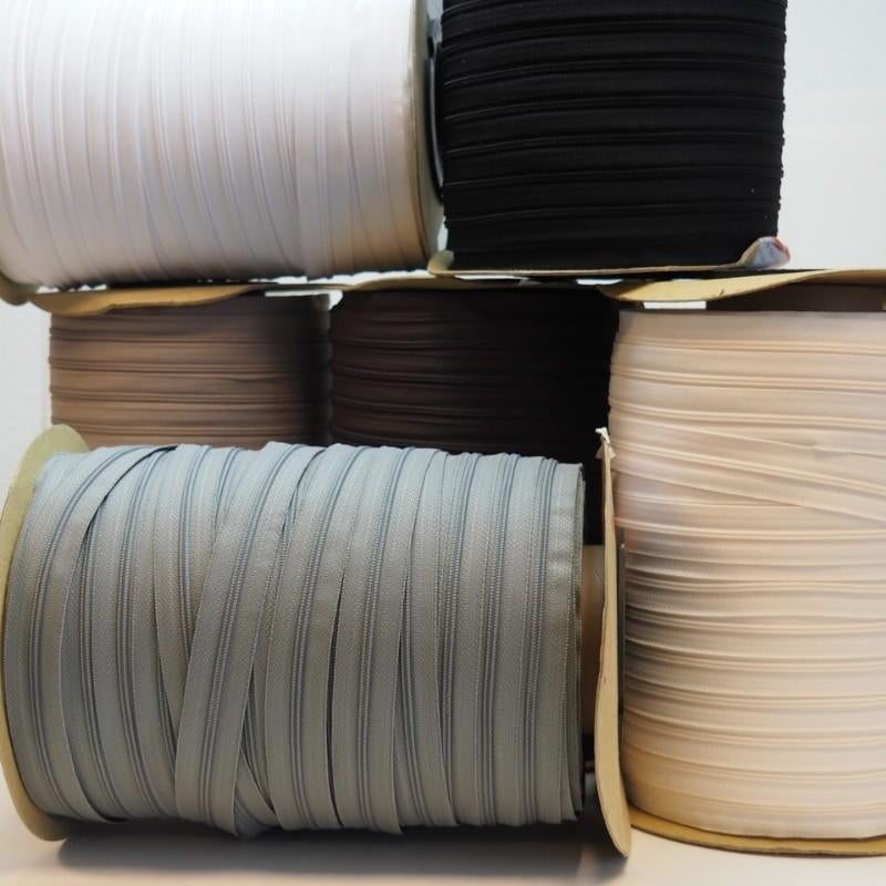 Ykk rits op rol met eventueel ritsschuivers, Hobby en Vrije tijd, Naaien en Fournituren, Ophalen of Verzenden, Nieuw, Rits of Sluiting