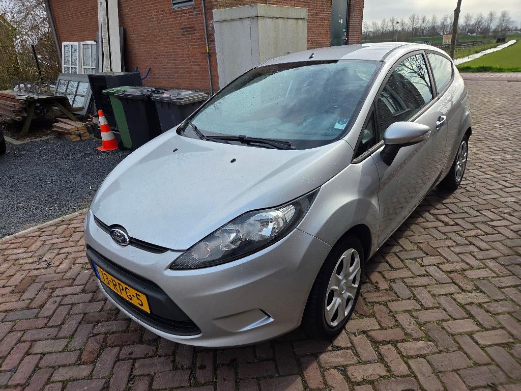 Ford Fiësta 1.25 44KW 3DR 2011 Grijs, Auto's, Voorwielaandrijving, Stof, 4 cilinders, Origineel Nederlands