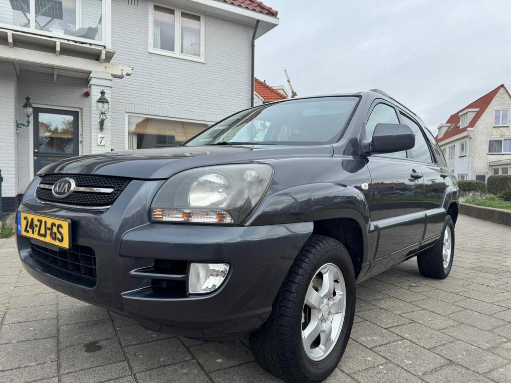 Kia Sportage 2.0 leer veel extra’s top auto, 1442 kg, 4 cilinders, Handgeschakeld, Grijs