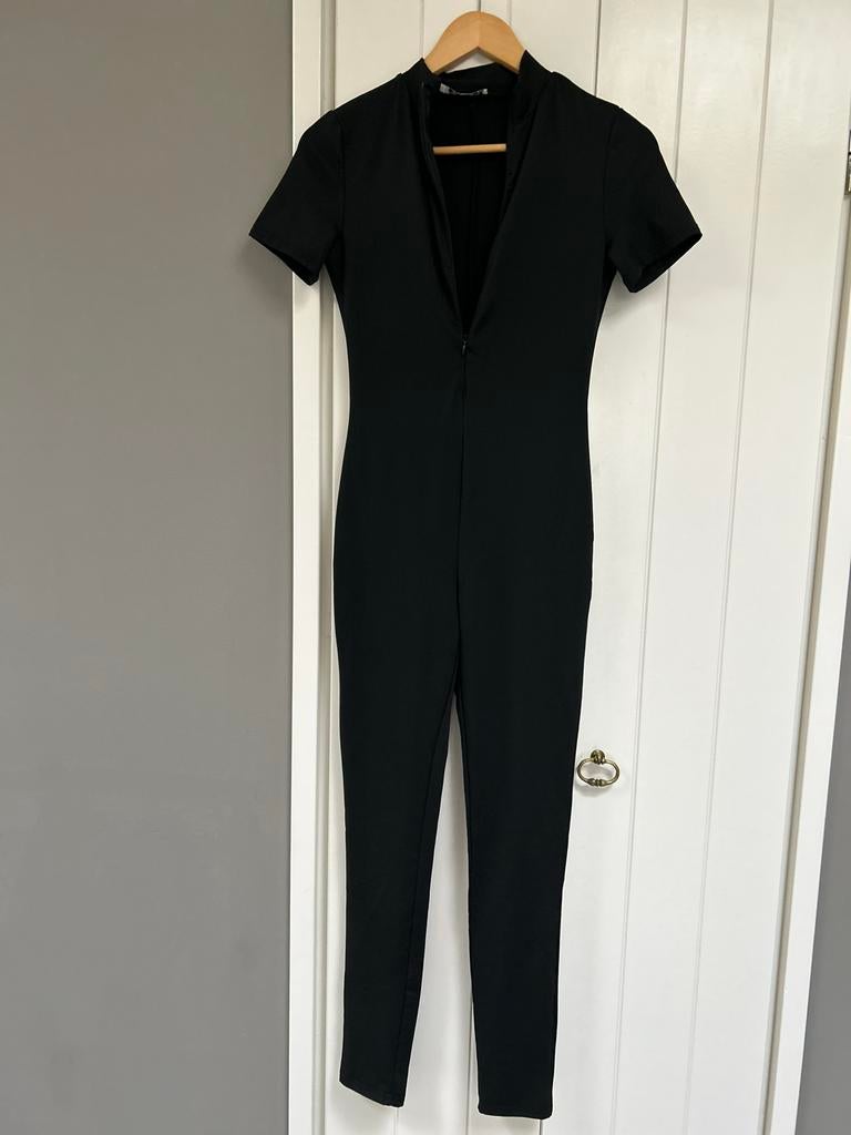 Zwarte catsuit met korte mouwen, Ophalen of Verzenden, Nieuw, Maat 38/40 (M), Zwart