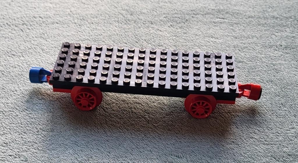 Lego trein blauwe rails wagon onderstel met magneten., Ophalen of Verzenden, Gebruikt, Losse stenen, Lego