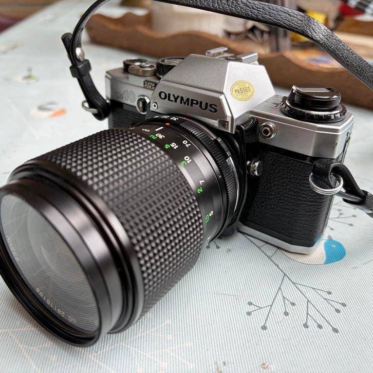 Olympus OM10 analoge spiegelreflex camera met Vivitar 35-70m, Audio, Tv en Foto, Fotocamera's Analoog, Ophalen of Verzenden, Gebruikt