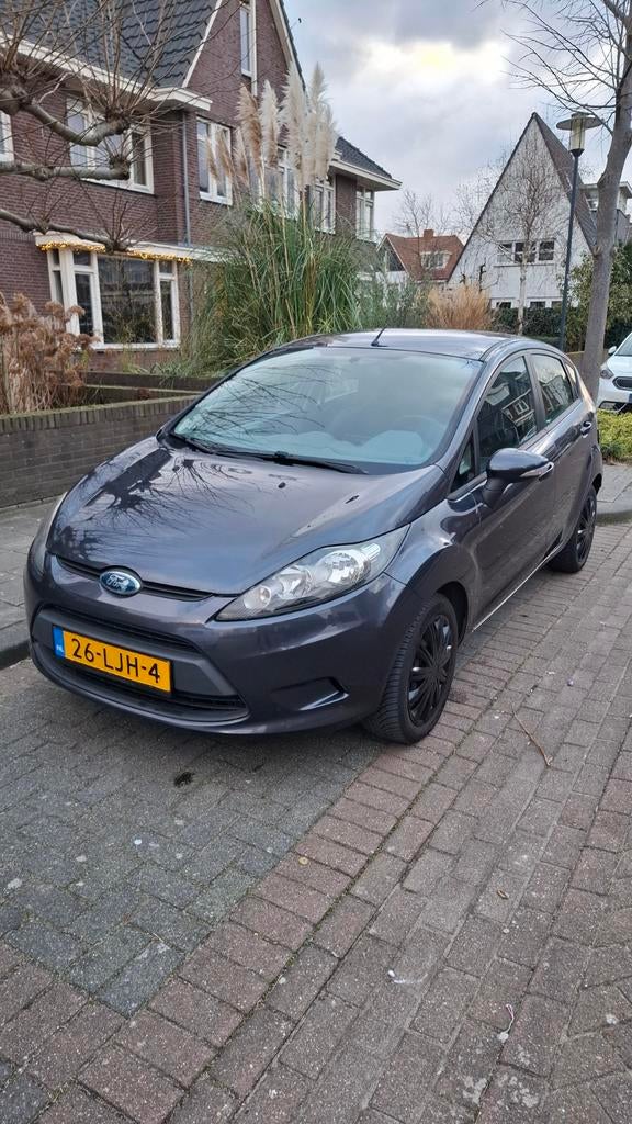 Ford Fiësta 1.25 5DR 2010 Grijs, Auto's, Ford, Voorwielaandrijving, 40 €/maand, 1242 cc, 4 cilinders