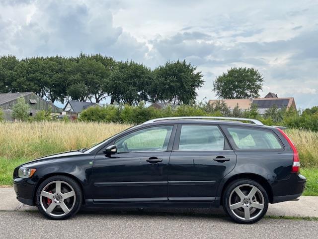 Volvo V50 2.4 Elan ECC Audio/CD Leder/stof LMV 18" Cruisecon, Gebruikt, 700 kg, Leder en Stof, Zwart