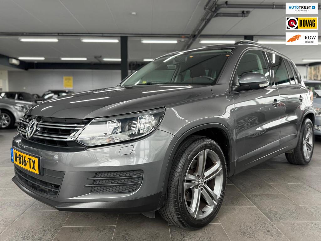 Volkswagen Tiguan 1.4 TSI Sport&Style navi clima cruise cont, Auto's, Voorwielaandrijving, Stof, 4 cilinders, 150 pk