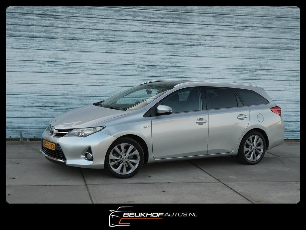 Toyota Auris Touring Sports 1.8 Hybrid Carplay Cruise Camera, Auto's, Toyota, Euro 5, Gebruikt, Zwart, Alcantara