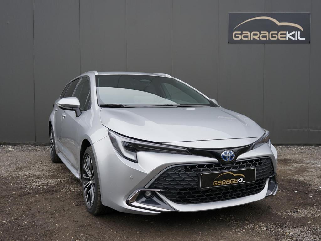Toyota Corolla Touring Sports Hybrid 140 Dynamic Team D / Fa, Gebruikt, 4 cilinders, Origineel Nederlands, Hybride Elektrisch/Benzine