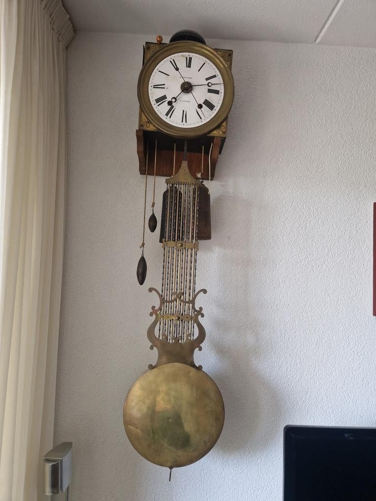 Franse antieke comtoise wandklok uit 1850, Ophalen