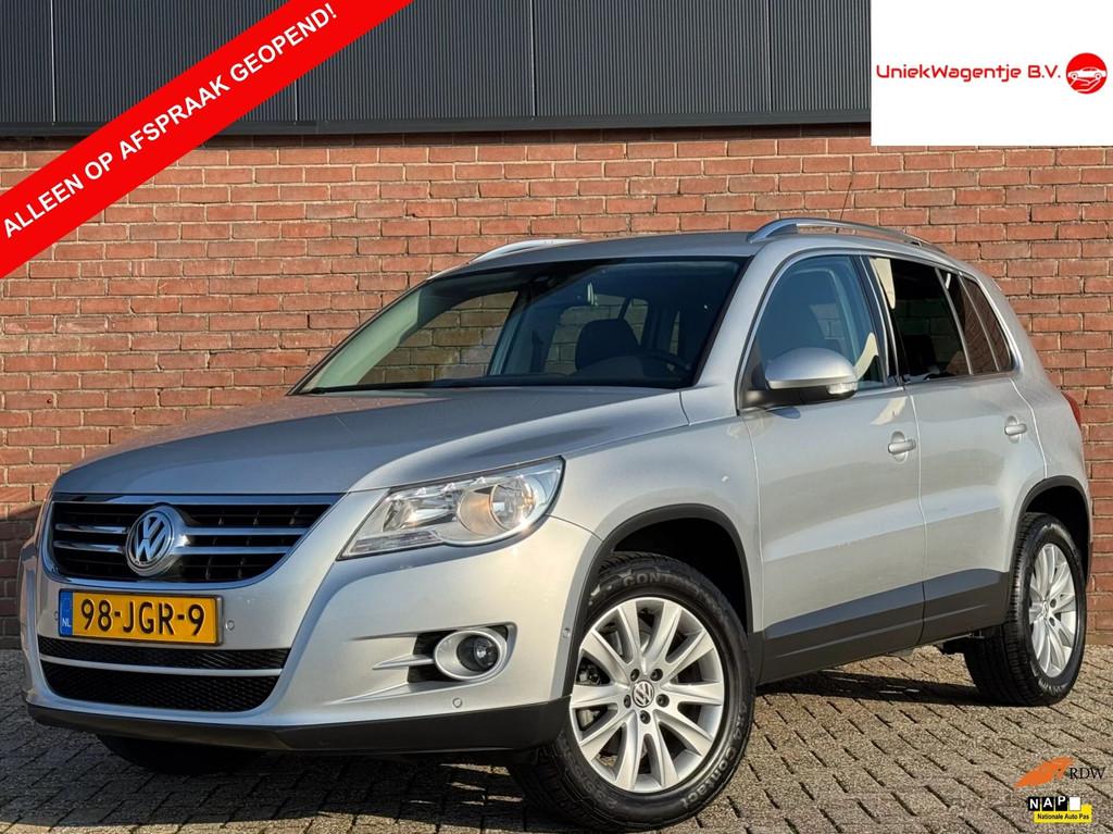 Volkswagen Tiguan 2.0 TSI | NL-AUTO! | LEDER! | NAVI!, Auto's, Gebruikt, Zwart, 4 cilinders, 1984 cc