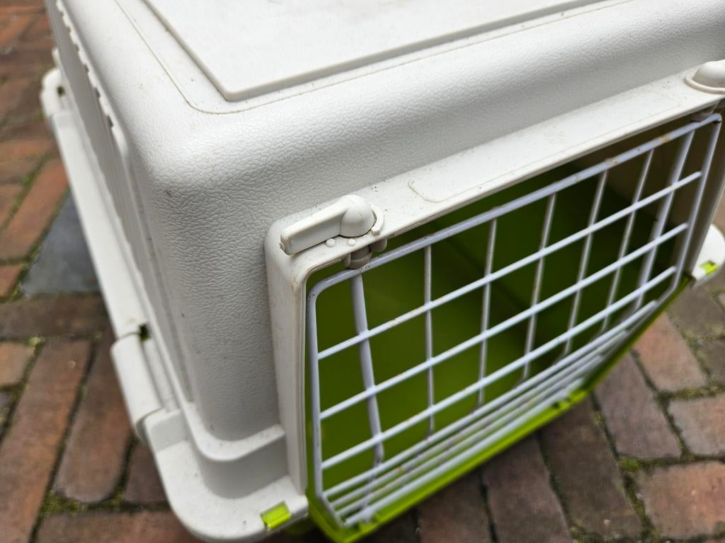 Reismand voor kat of (kleine) hond., Ophalen