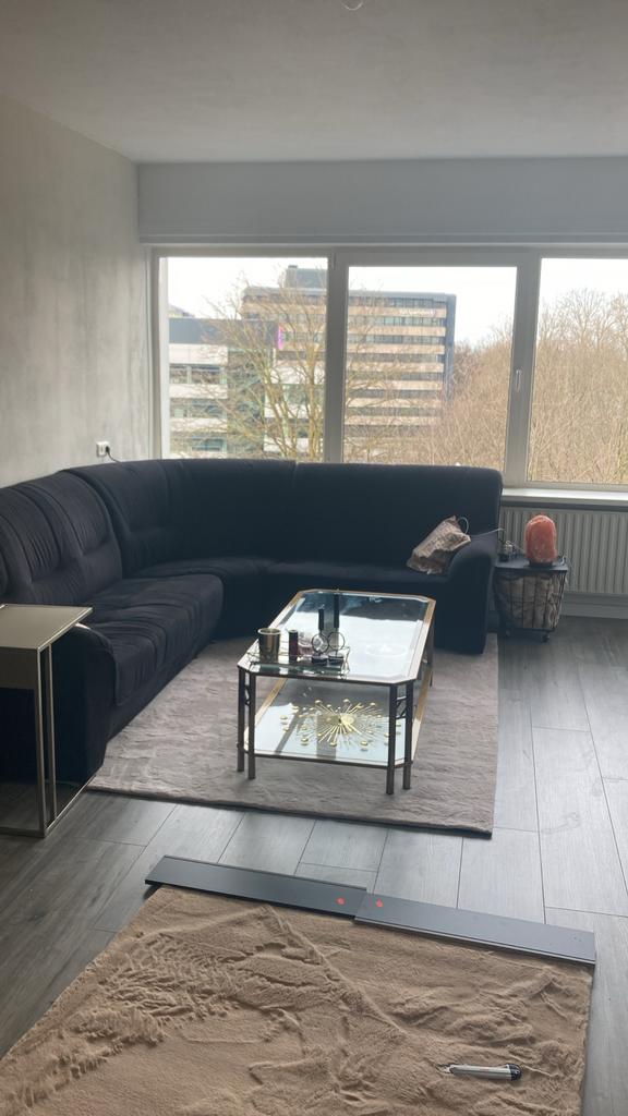 Zwarte, gebruikte hoekbank, Huis en Inrichting, Banken | Bankstellen, Ophalen, Gebruikt, Hoekbank, Stof