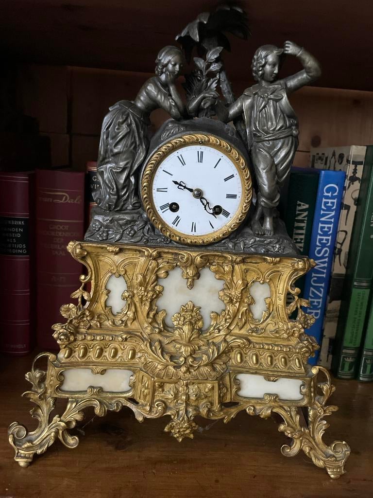 Antieke Franse pendule met figuren, Ophalen