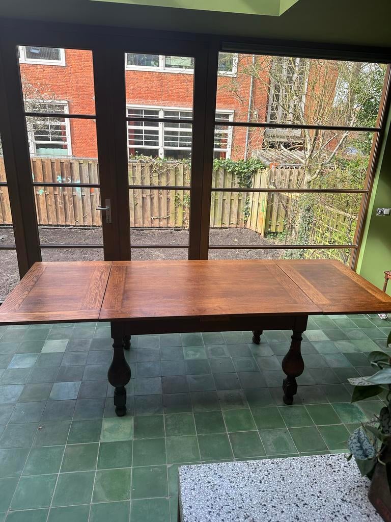 Antieke uitschuifbare eiken eettafel, Ophalen