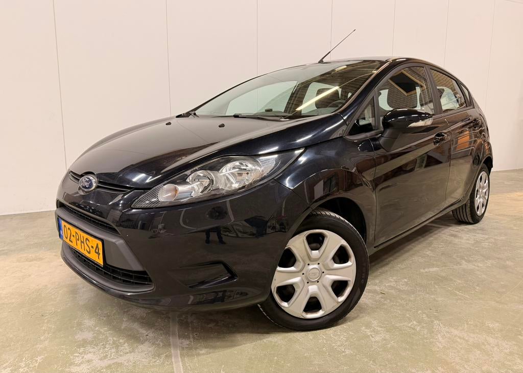 Ford Fiesta 1.25 Limited | NAP | Airco | APK ‘27 | Trekhaak, Auto's, Voorwielaandrijving, Stof, 40 €/maand, 1242 cc