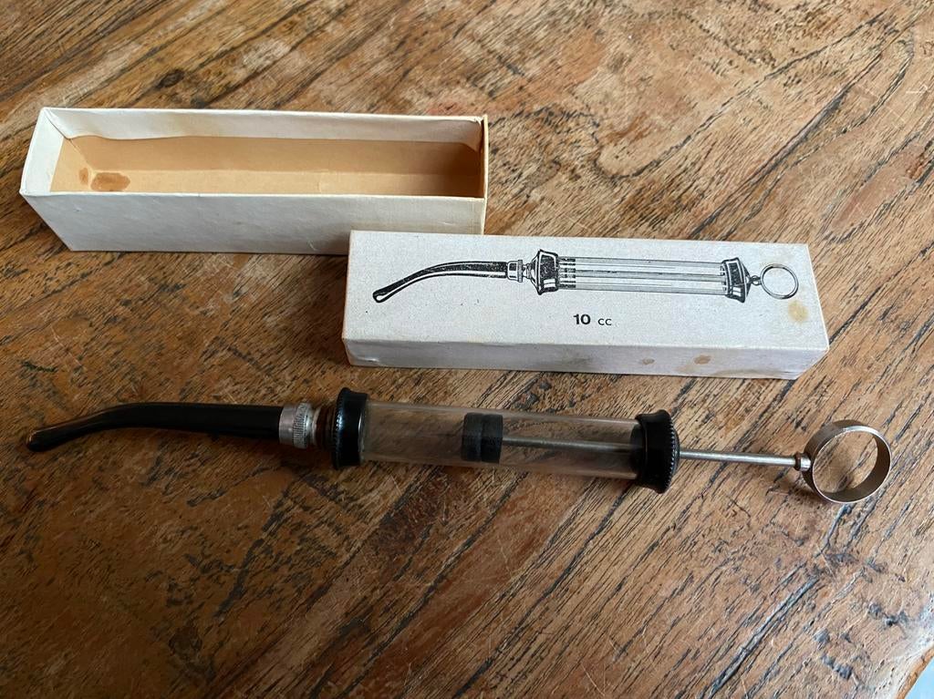 Antieke oorspuit met bakeliet handvat en oorstuk, Antiek en Kunst, Ophalen of Verzenden