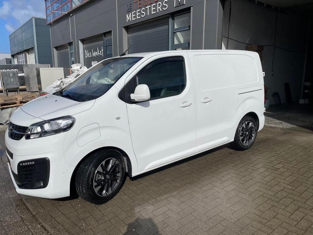 Opel Vivaro 50kWh 136pk L1h1 2021 Innovation  Wit, Auto's, Bestelauto's, 32 min, Wit, Origineel Nederlands, Elektrisch