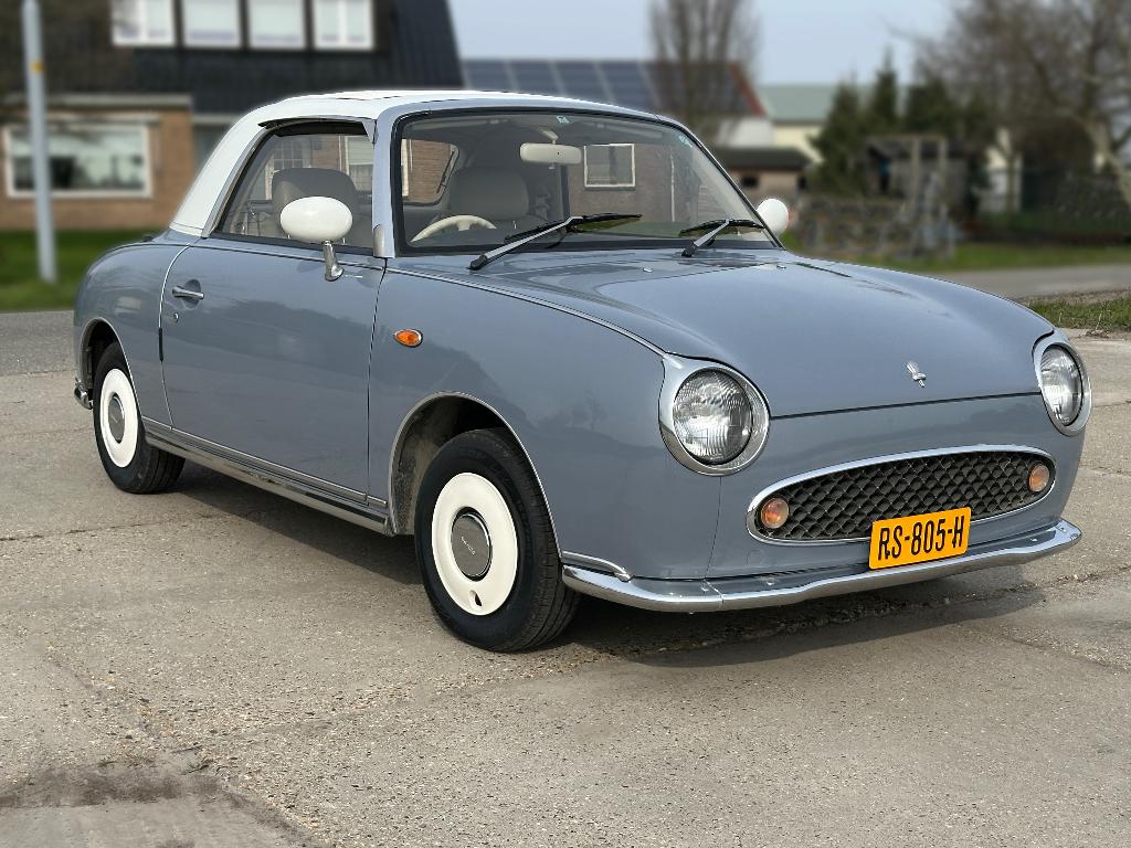 Nissan Figaro Cabrio 1991 Lapis Gray, Auto's, Nissan, Particulier, Overige modellen, Airconditioning, Centrale vergrendeling, Elektrische ramen