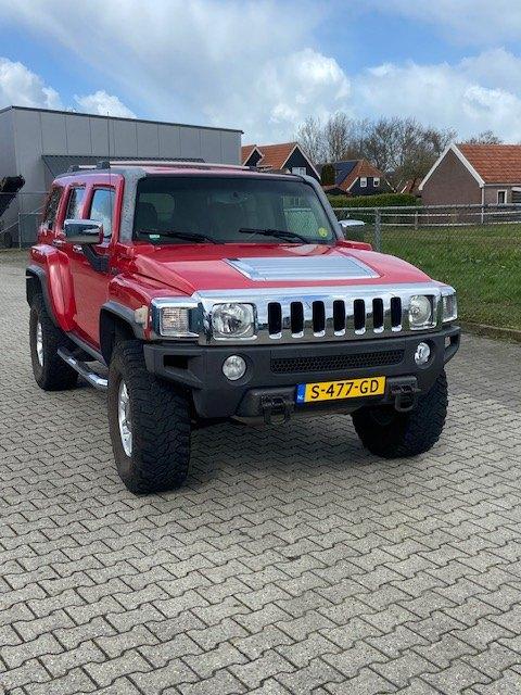 Hummer H3 3.7 L5 SUV AUT 2009 Rood, Auto's, Automaat, 2210 kg, Overige kleuren, Stoelverwarming