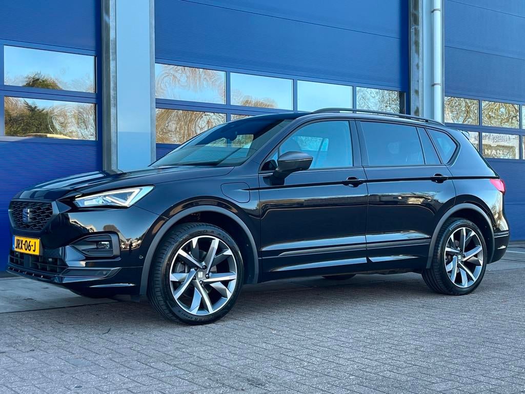 Seat TARRACO 1.4 TSI e-Hybrid PHEV 245pk FR | Panoramadak |, Stof, 4 cilinders, Adaptive Cruise Control, Zwart
