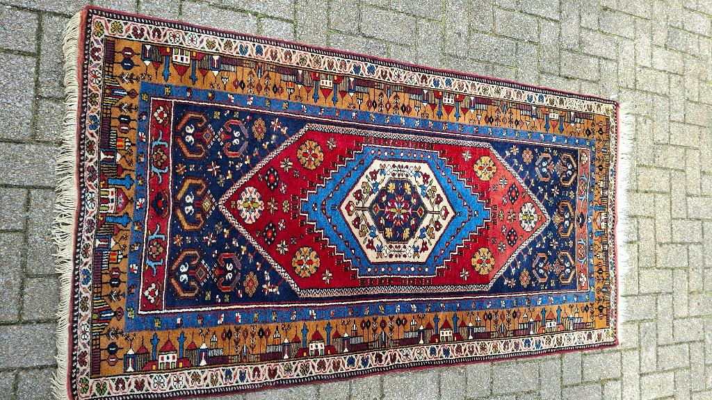 Oud perzisch tapijt, Ophalen