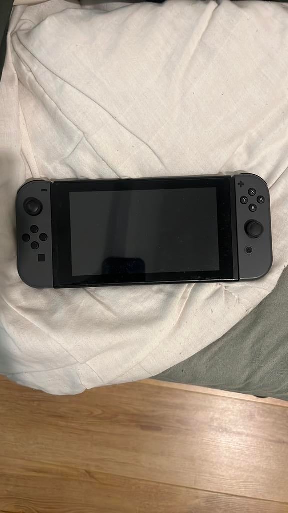 Nintendo switch met lader met spelletje met controller, Ophalen of Verzenden, Zo goed als nieuw, Zonder controller, Switch Original