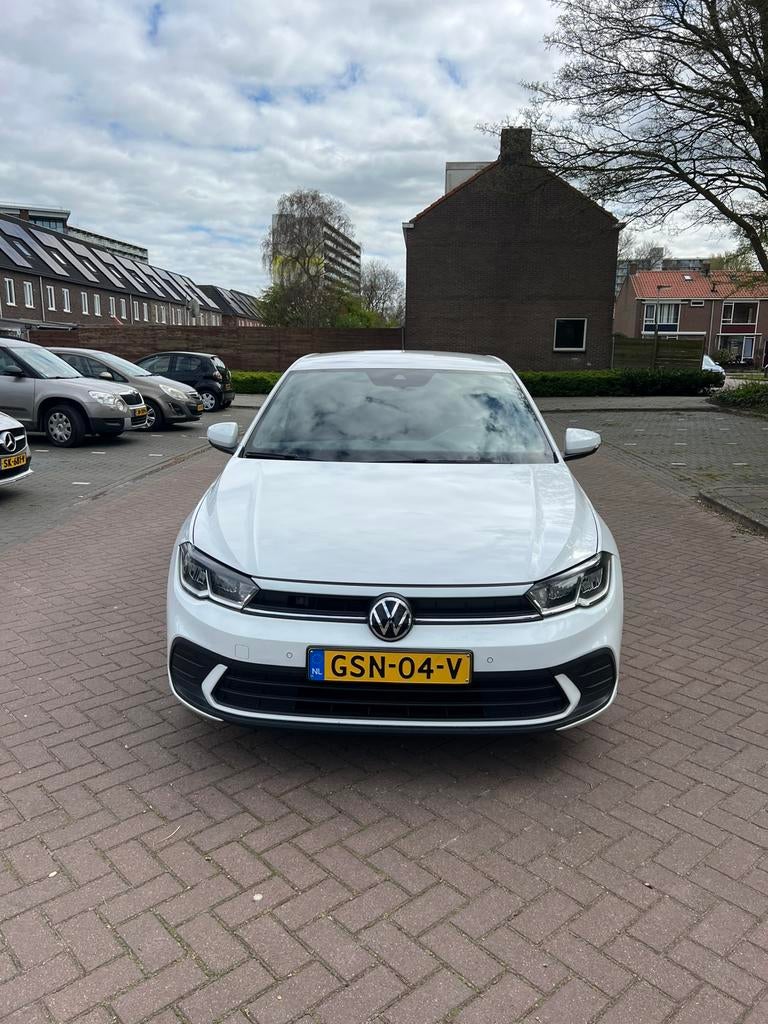 Volkswagen Polo 1.0 TSI Dsg-7 2024 Wit (lichte-schade), Stof, Zwart, 95 pk, USB